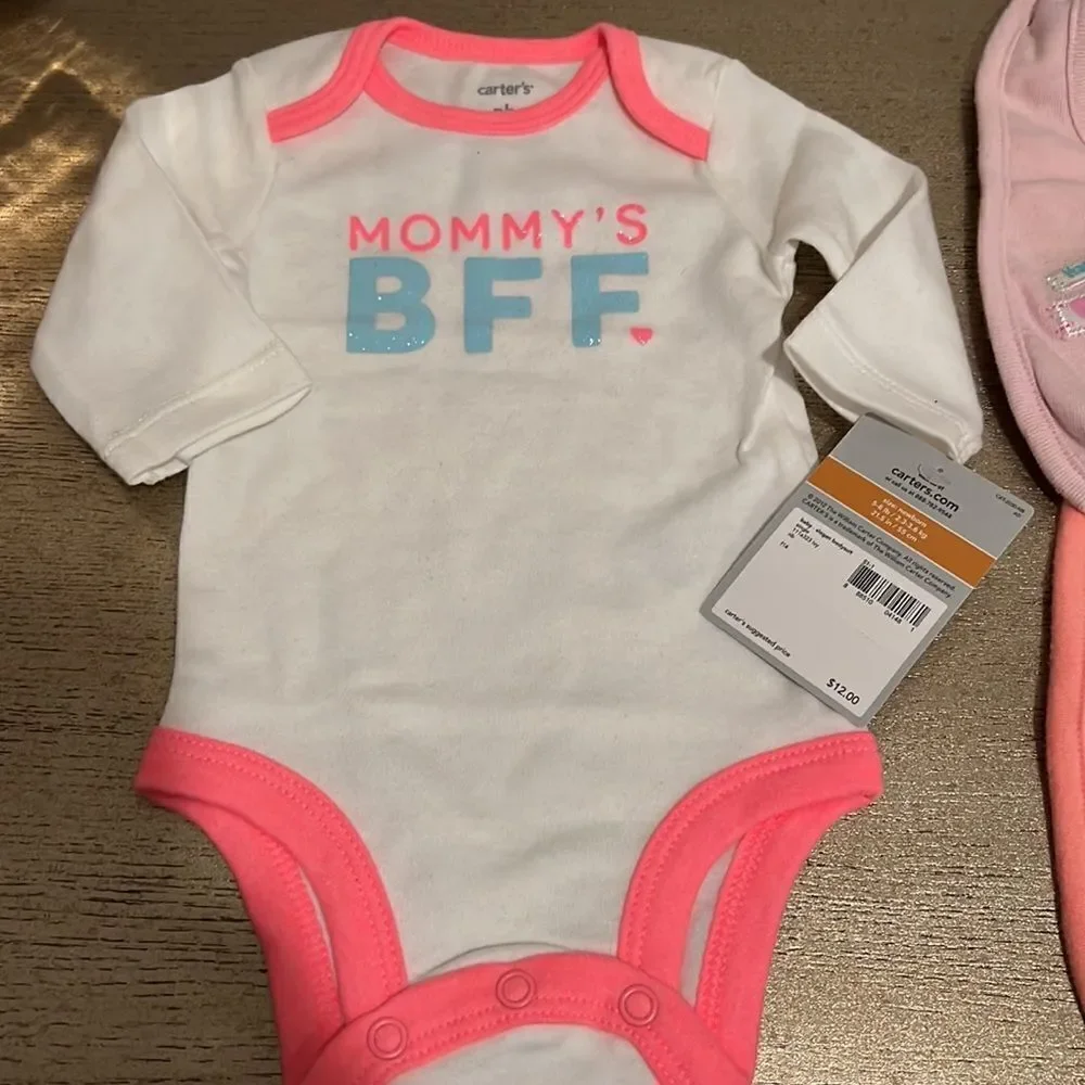 baby onesie and bib